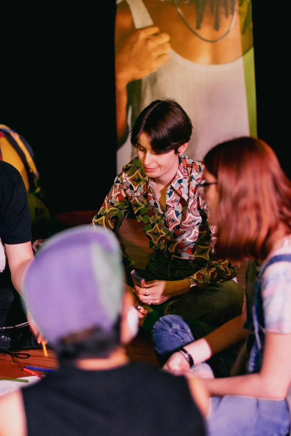 Two participants in conversation during a small group exercise
